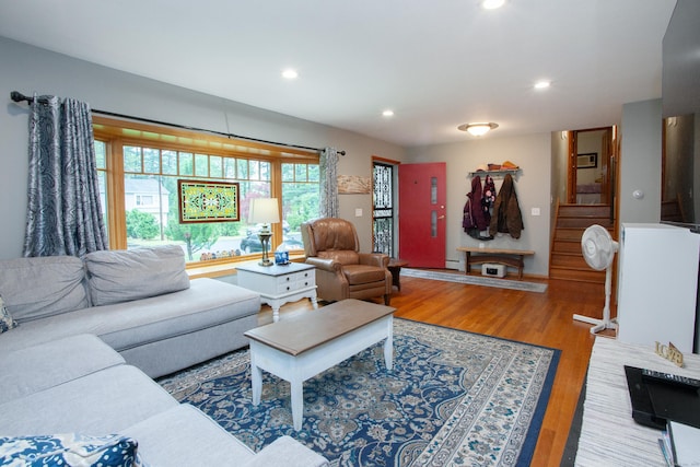 living room featuring recessed lighting and wood finished floors