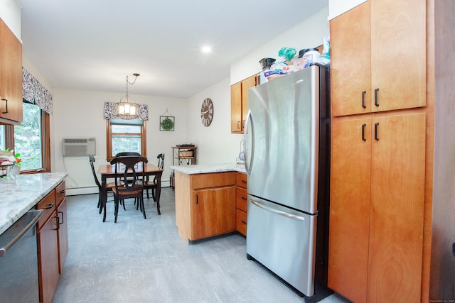 kitchen with a peninsula, pendant lighting, light floors, appliances with stainless steel finishes, and a wall mounted AC