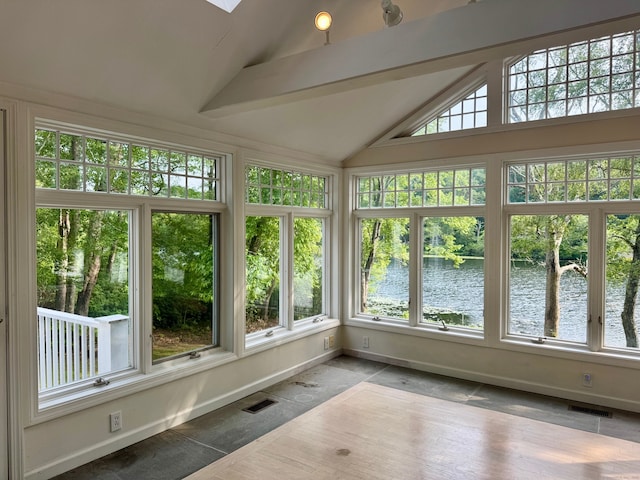157 Pine Lake Rd, Westbrook, CT 06498 - unfurnished sunroom featuring a water view, healthy amount of natural light, vaulted ceiling, and a skylight