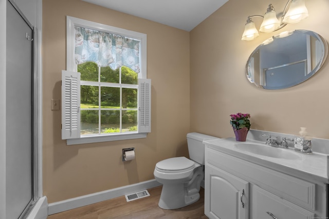 157 Pine Lake Rd, Westbrook, CT 06498 - bathroom featuring vanity, wood finished floors, and a shower with shower door