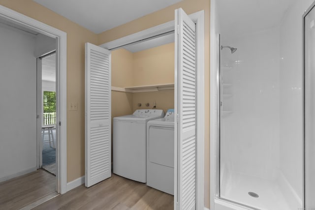 157 Pine Lake Rd, Westbrook, CT 06498 - laundry area featuring light wood-style flooring and independent washer and dryer