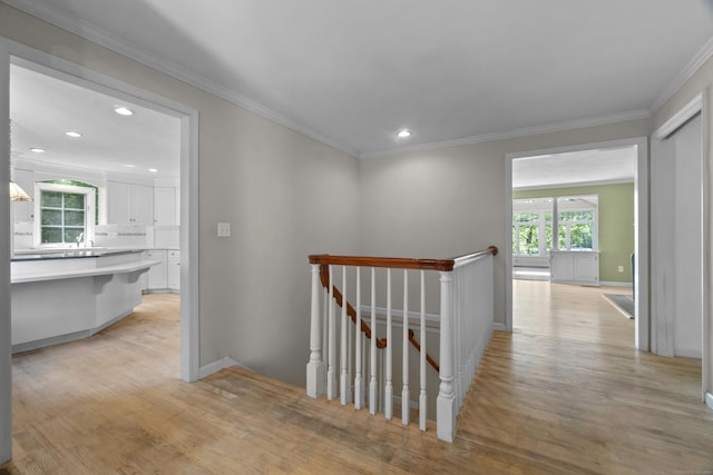 157 Pine Lake Rd, Westbrook, CT 06498 - hall featuring an upstairs landing, crown molding, light wood-style floors, and recessed lighting