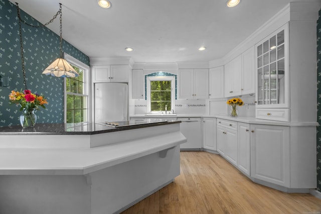 157 Pine Lake Rd, Westbrook, CT 06498 - kitchen with dishwasher, refrigerator, healthy amount of natural light, white cabinets, and recessed lighting
