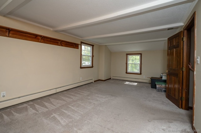 empty room featuring a baseboard heating unit, light carpet, a baseboard radiator, and baseboards