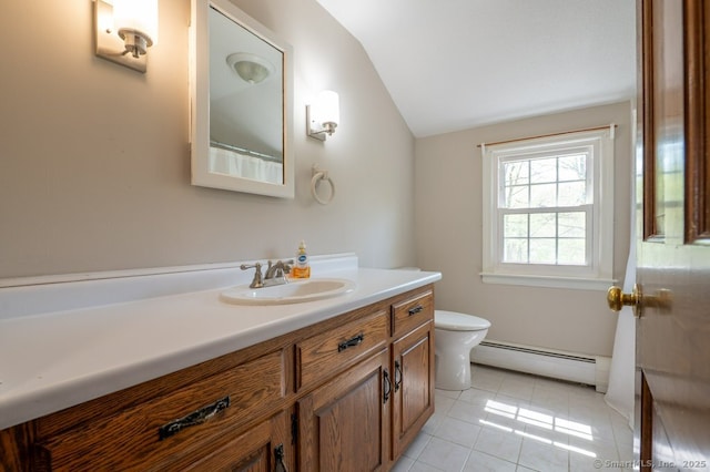 full bathroom featuring a baseboard radiator, vaulted ceiling, tile patterned floors, vanity, and toilet