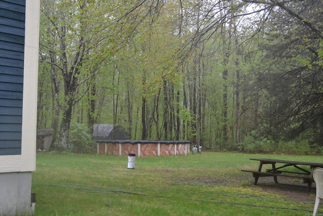 133 Music Vale Rd, Salem, CT 06420 - view of grassy yard featuring a covered pool and a view of trees
