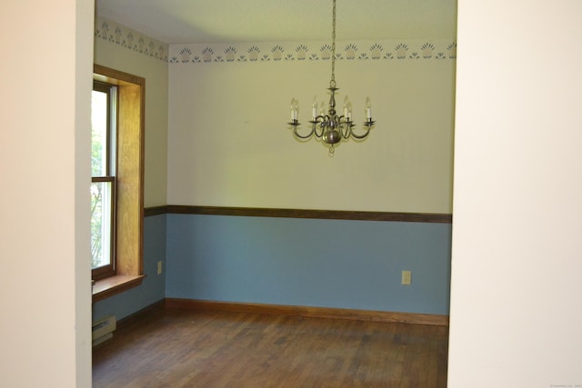 133 Music Vale Rd, Salem, CT 06420 - empty room featuring a chandelier, baseboard heating, wood finished floors, and baseboards