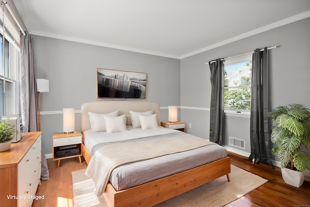 6 Thompson St, Fairfield, CT 06825 - bedroom featuring light wood-style floors and crown molding