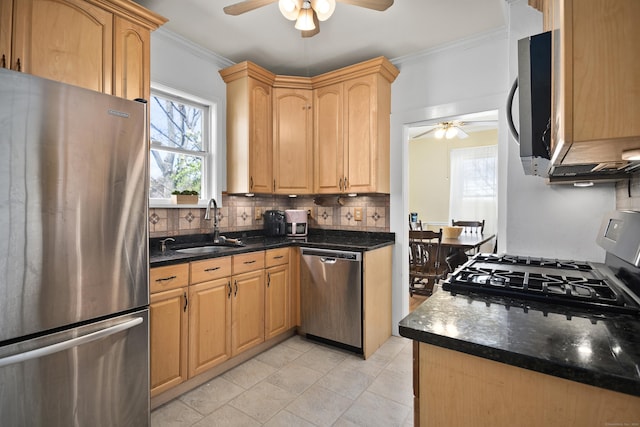 6 Thompson St, Fairfield, CT 06825 - kitchen with stainless steel appliances, ceiling fan, ornamental molding, a sink, and backsplash