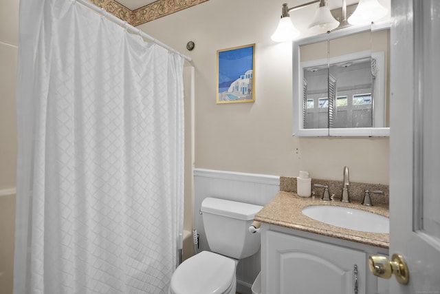 6 Thompson St, Fairfield, CT 06825 - bathroom with a wainscoted wall, vanity, and toilet