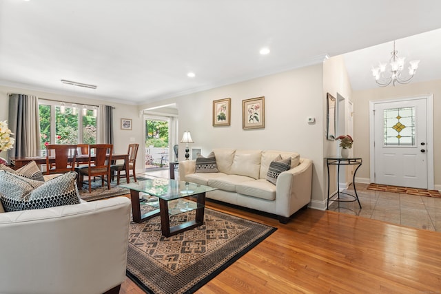 6 Shadow Ln, Norwalk, CT 06851 - living area featuring crown molding, a chandelier, baseboards, wood finished floors, and recessed lighting
