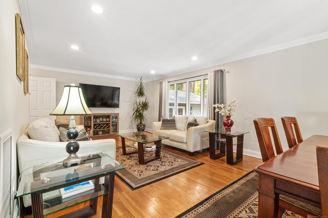 6 Shadow Ln, Norwalk, CT 06851 - living room featuring wood finished floors, ornamental molding, baseboards, and recessed lighting