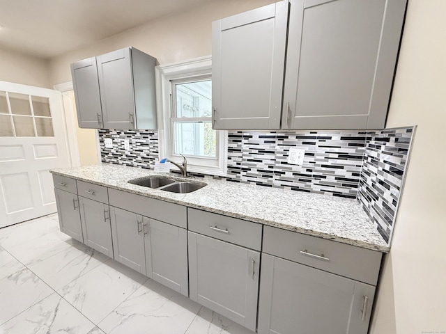 815 Alling Rd, Orange, CT 06477 - kitchen featuring gray cabinets, a sink, and light marble finish floors
