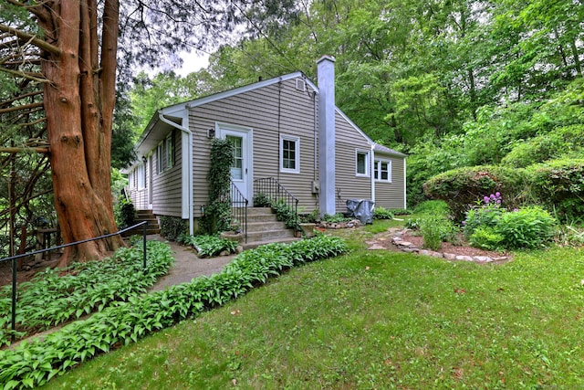 18 Terrace Rd, Seymour, CT 06483 - back of property with a chimney and a yard