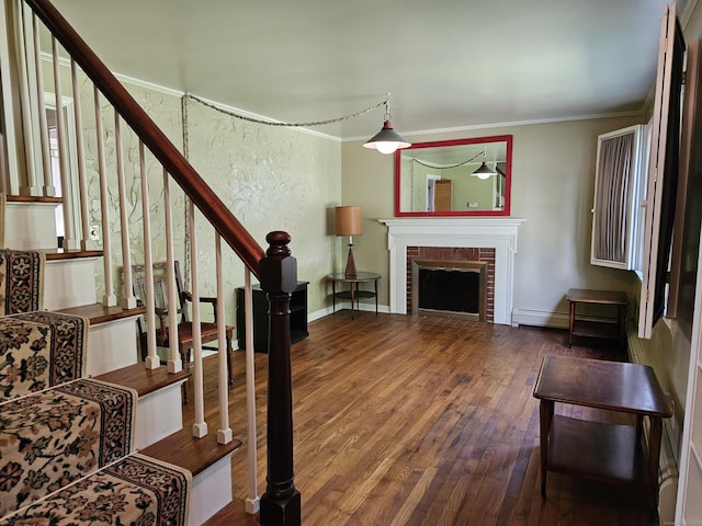 39 Charter Rd, Ellington, CT 06029 - living area featuring wood finished floors, crown molding, stairs, and a fireplace