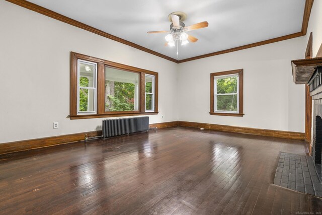 516 Savin Ave, West Haven, CT 06516 - unfurnished living room featuring radiator, a fireplace, wood-type flooring, ceiling fan, and crown molding