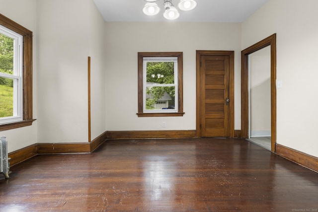 516 Savin Ave, West Haven, CT 06516 - spare room featuring a chandelier, healthy amount of natural light, and wood-type flooring