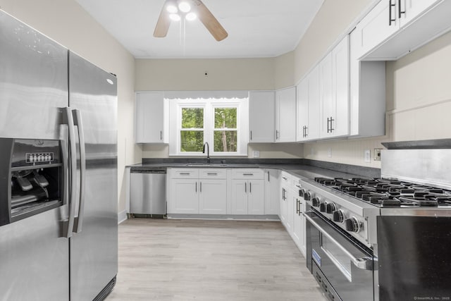 516 Savin Ave, West Haven, CT 06516 - kitchen featuring appliances with stainless steel finishes, ceiling fan, white cabinets, and dark countertops