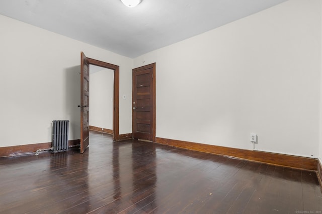 516 Savin Ave, West Haven, CT 06516 - unfurnished room featuring radiator heating unit and hardwood / wood-style flooring