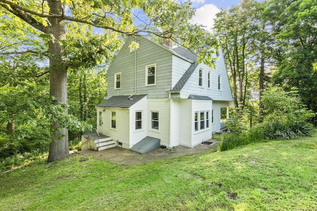 516 Savin Ave, West Haven, CT 06516 - back of house with roof with shingles, a chimney, a yard, and a deck