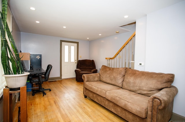 office featuring light wood-style floors, baseboards, and recessed lighting