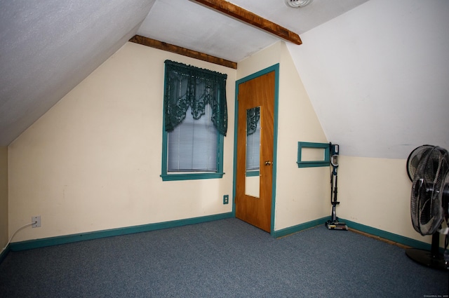 bonus room featuring carpet, vaulted ceiling, and baseboards