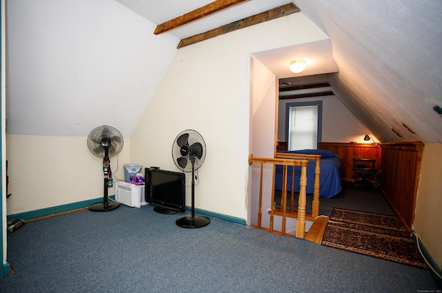additional living space with lofted ceiling, carpet, and baseboards