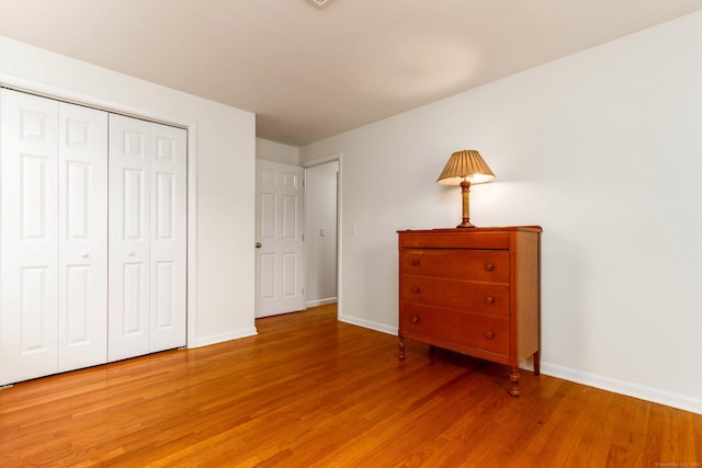 26 Sharon Cir, Meriden, CT 06450 - bedroom with light wood-style floors and a closet