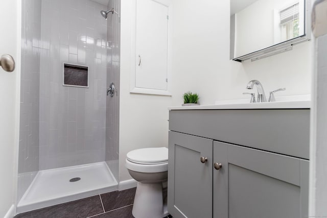 26 Sharon Cir, Meriden, CT 06450 - bathroom featuring vanity, tiled shower, and tile patterned floors