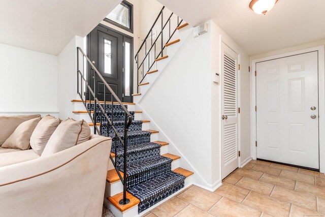 26 Sharon Cir, Meriden, CT 06450 - entrance foyer featuring stairs and baseboards