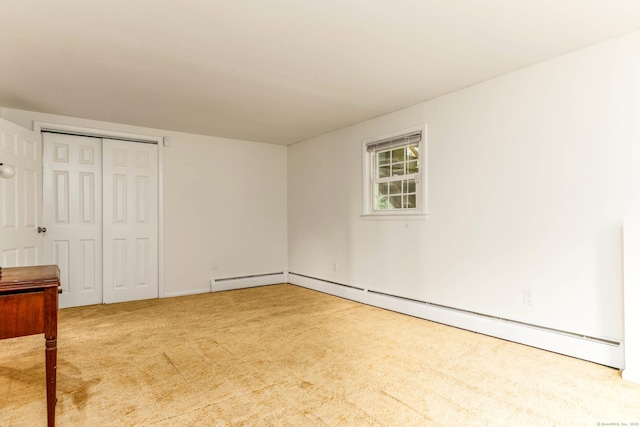 26 Sharon Cir, Meriden, CT 06450 - unfurnished bedroom with a baseboard radiator, carpet, and a closet