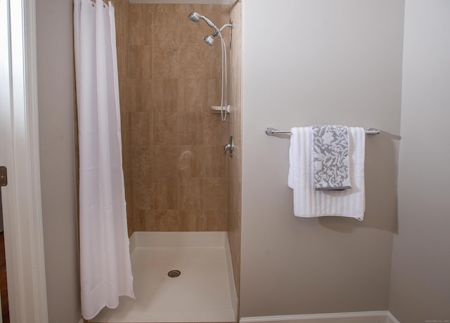 bathroom featuring a stall shower