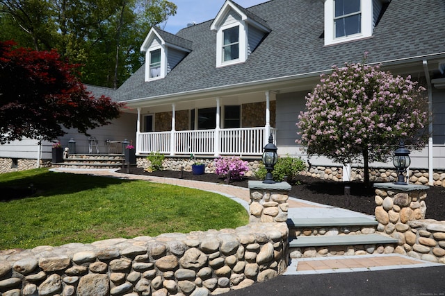 17 Grays Farm Rd, Weston, CT 06883 - new england style home featuring a porch, roof with shingles, and a front lawn