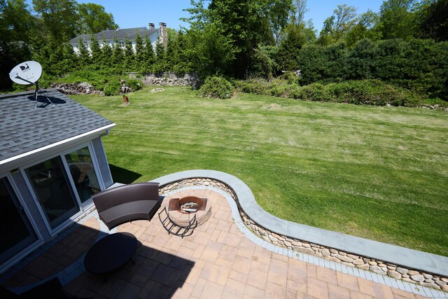 17 Grays Farm Rd, Weston, CT 06883 - view of green lawn with a patio area and a fire pit