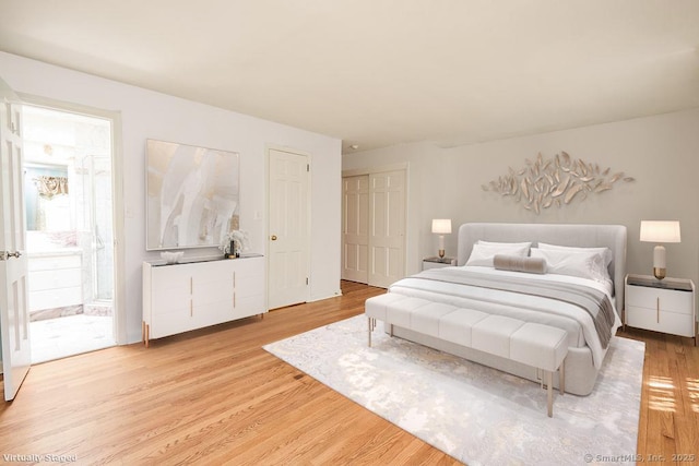 17 Grays Farm Rd, Weston, CT 06883 - bedroom featuring light wood-style floors and connected bathroom