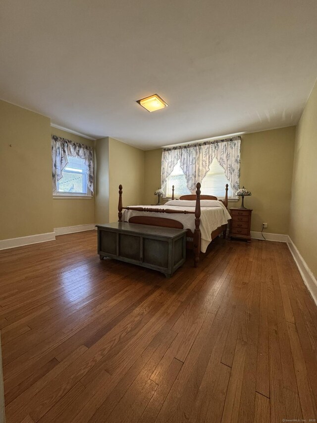 135 Lambert Ave, Meriden, CT 06451 - bedroom featuring dark wood-style flooring and baseboards
