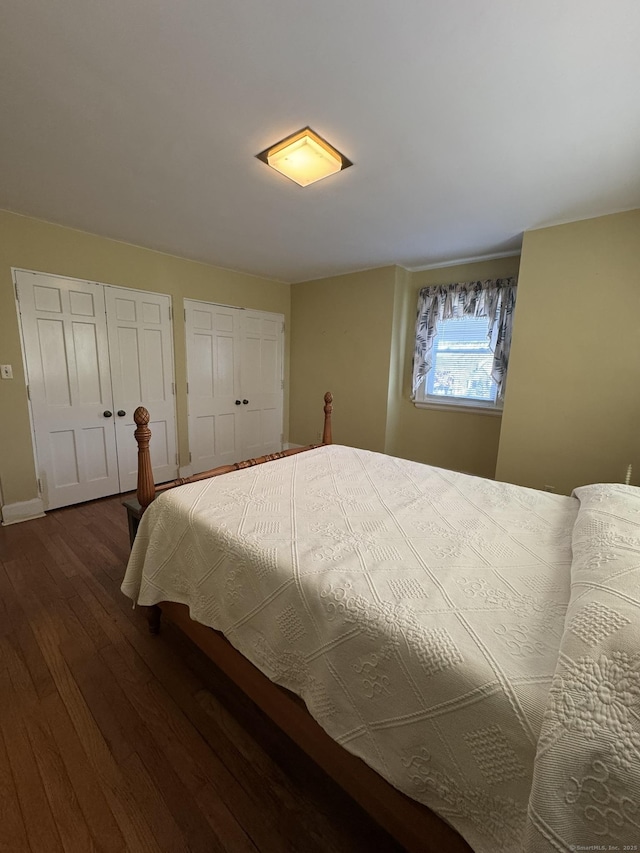 135 Lambert Ave, Meriden, CT 06451 - bedroom featuring wood finished floors, multiple closets, and baseboards