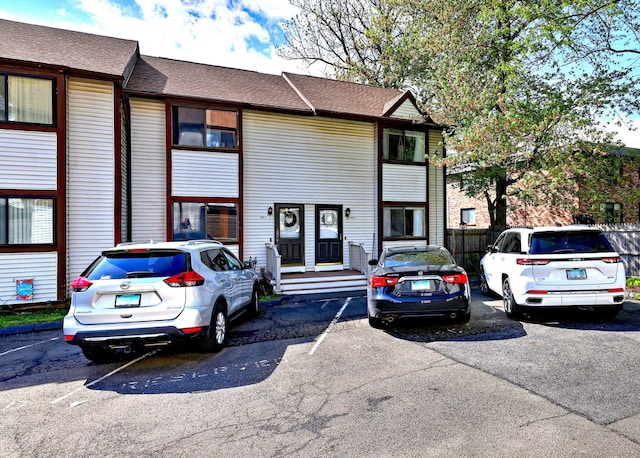 529 Woodward Ave Apt D, New Haven, CT 06512 - view of property with uncovered parking and a shingled roof