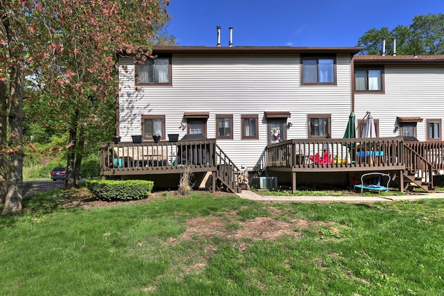 529 Woodward Ave Apt D, New Haven, CT 06512 - back of property with a wooden deck, central air condition unit, a lawn, and stairs
