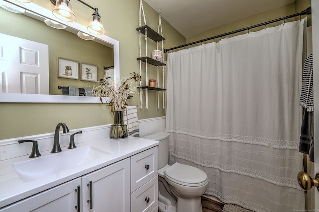 529 Woodward Ave Apt D, New Haven, CT 06512 - bathroom featuring wainscoting, toilet, and vanity