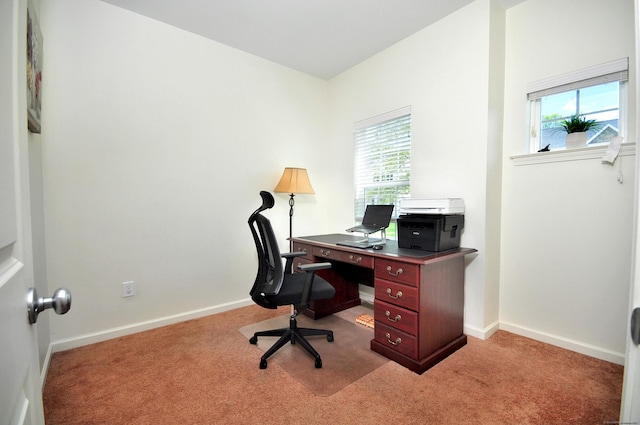 office area with light carpet, plenty of natural light, and baseboards