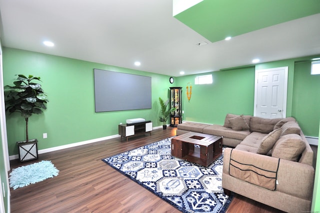 living area with wood finished floors, baseboards, recessed lighting, and healthy amount of natural light