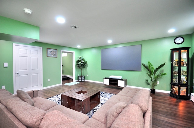 living area with recessed lighting, wood finished floors, and baseboards