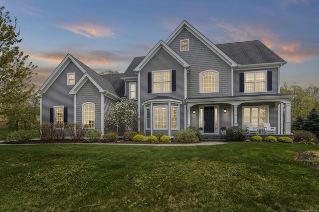 20 Peach Ln, East Lyme, CT 06333 - view of front of house featuring a front yard and a porch