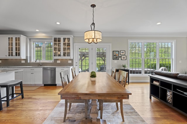 20 Peach Ln, East Lyme, CT 06333 - dining space featuring ornamental molding, light wood finished floors, french doors, and recessed lighting