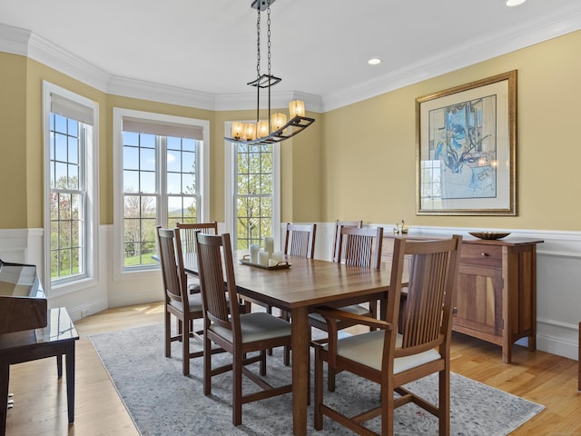 20 Peach Ln, East Lyme, CT 06333 - dining space featuring a chandelier, ornamental molding, wainscoting, light wood-style floors, and recessed lighting