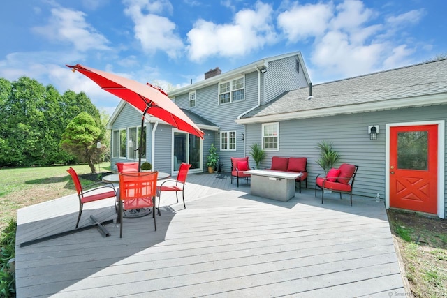 wooden terrace featuring an outdoor hangout area and outdoor dining area