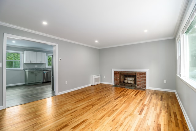 17 Alan Ave, Danbury, CT 06811 - unfurnished living room with light wood finished floors, ornamental molding, baseboards, recessed lighting, and a fireplace