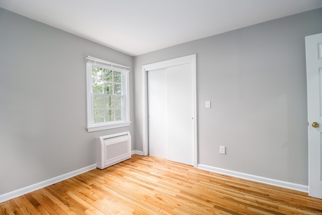 17 Alan Ave, Danbury, CT 06811 - unfurnished bedroom with light wood-style floors, baseboards, and a closet