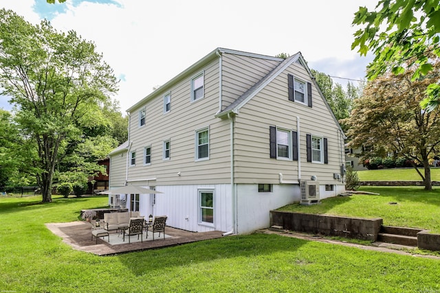 17 Alan Ave, Danbury, CT 06811 - rear view of property featuring a lawn, a cooling unit, an outdoor hangout area, and a patio